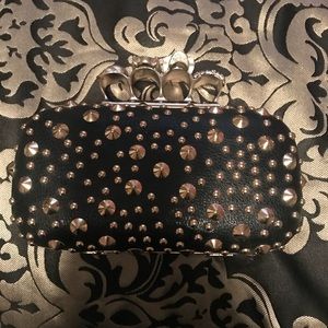 Brass knuckles clutch